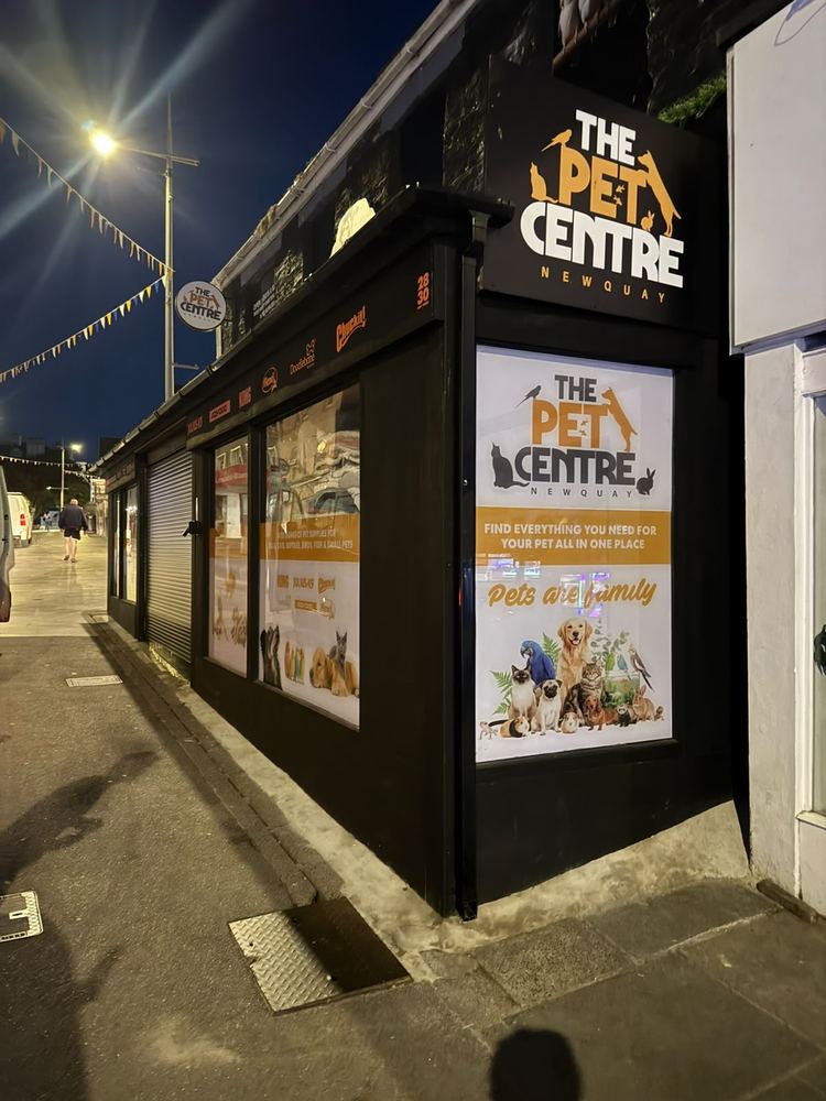 The Pet Centre Newquay shopfront at night