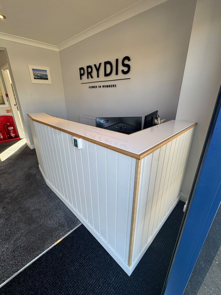 Fitted reception desk and wall signage, commercial premises
